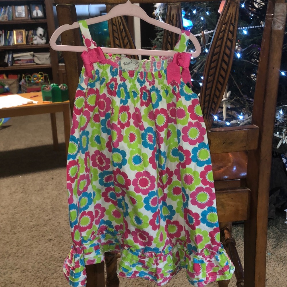 Girls floral sundress with ruffle bottom.